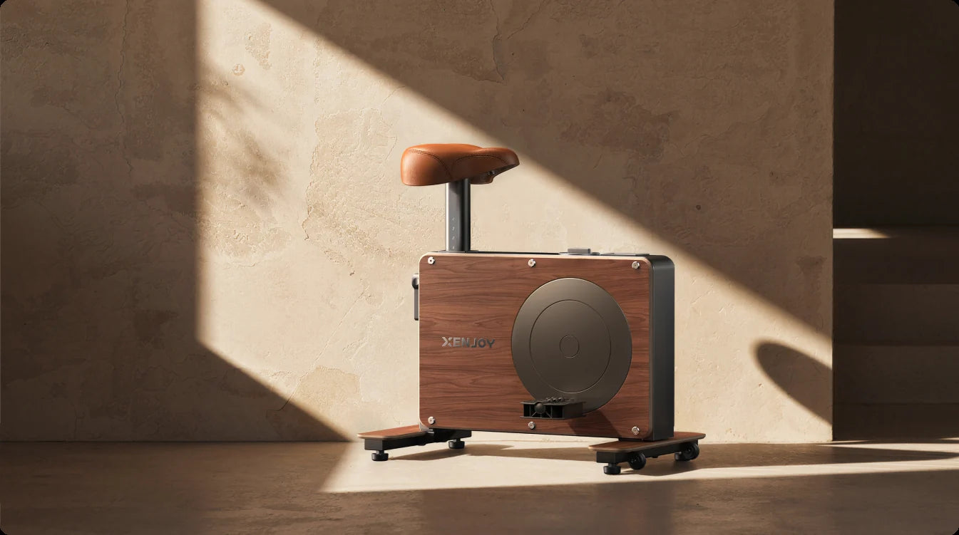Walnut-finish XENJOY Cube Cycle in a sunlit architectural interior