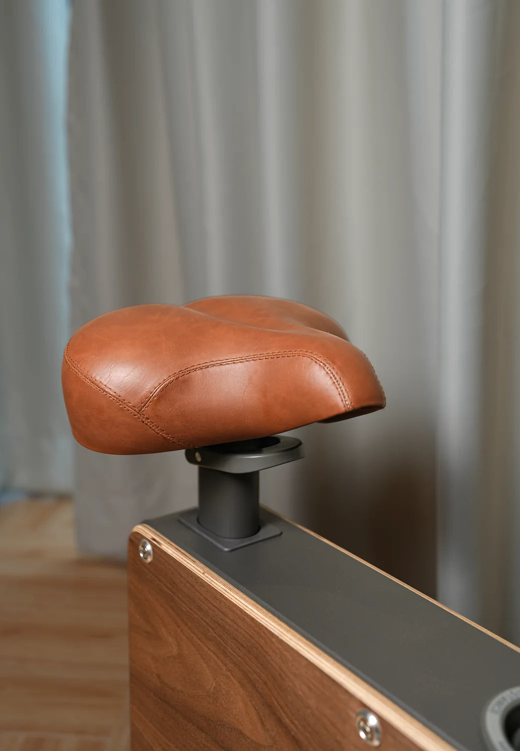 Close detail of the Cube Cycle padded seat and stitching